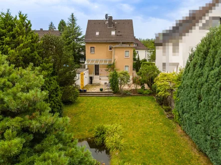 Titelbild - Haus kaufen in Bergisch Gladbach - Bergisch Gladbach:Charmantes Einfamilienhaus in Top Lage