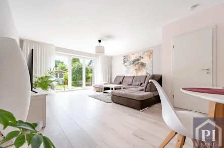 Großes Wohn- und Esszimmer - Haus kaufen in Kiel - Familien aufgepasst- Frisch renoviertes Reihenmittelhaus in Kiel-Meimersdorf