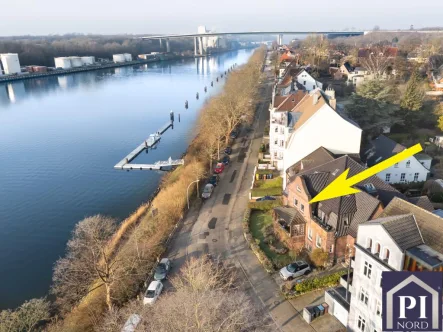 Wohnen am Nord-Ostsee-Kanal - Wohnung kaufen in Kiel - Bezugsfreie Wohnung mit Kanalblick und Gartenanteil