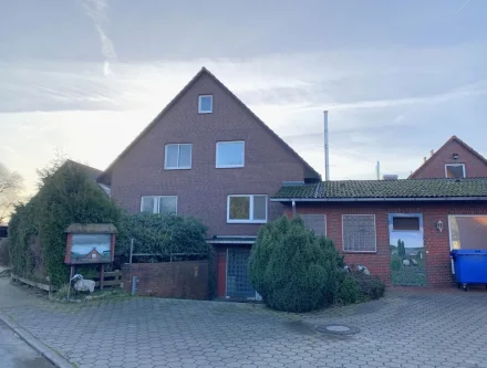 Frontansicht - Haus kaufen in Garlstorf - Geräumiges Einfamilienhaus mit zugehöriger Fleischerei in Garlstorf