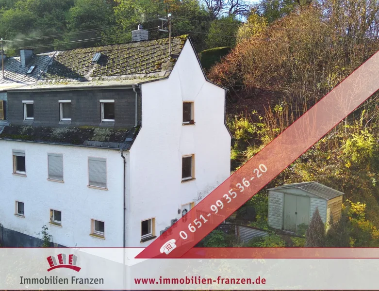 Titelbild - Haus kaufen in Trier - Trier-Kürenz: Zweifamilienhaus mit gut vermietbaren Wohnungen und neuwertiger Heizung – Ideal für Familien oder Kapitalanleger!