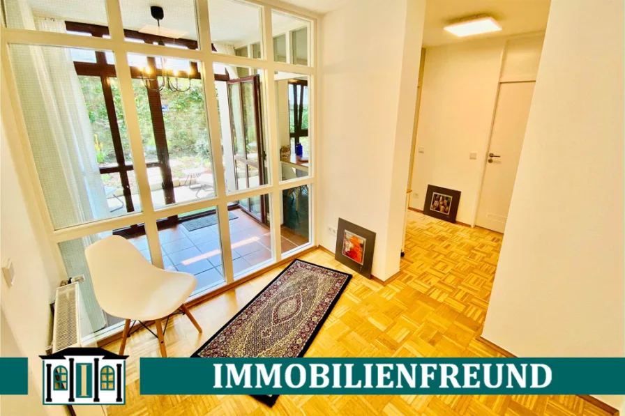 Titelbild - Wohnung kaufen in Wuppertal - Luxuriöses Apartment mit mediterranem Garten und TG-Platz