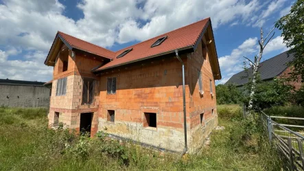 Hinteransicht  - Haus kaufen in Jesewitz / Wölpern - Charmantes Grundstück mit historischer Scheune im Rohbau