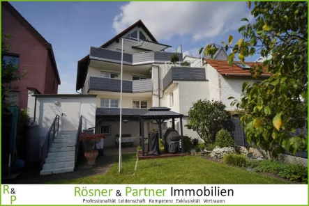 Rückansicht - Haus kaufen in Frankfurt am Main - *Gepflegtes 3-Familienhaus nahe der Niddaauen in Harheim*