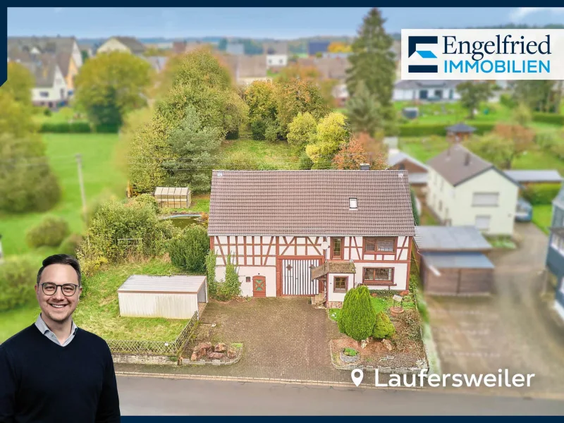 Titelbild - Haus kaufen in Laufersweiler - Charmantes Bauernhaus auf weitläufigem Grundstück mit Scheune und Nebengebäuden