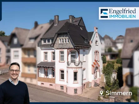 Titelbild - Haus kaufen in Simmern - Villenartiges Dreifamilienhaus im Jugendstil mit Blick auf das Wahrzeichen der Kreisstadt