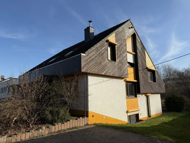 Seitenansicht - Haus kaufen in Marienrachdorf - Architektonisch ansprechendes Wohnhaus für gehobene Ansprüche