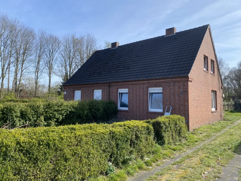 Vorderansicht - Haus kaufen in Papenburg - Doppelhaushälfte in zentraler Lage am Obenende!