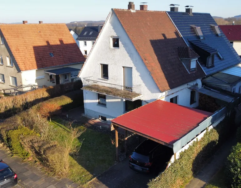 Exposéfoto - Haus kaufen in Lage - Ob als Paar oder kleine Familie – hier wohnen Sie richtig!