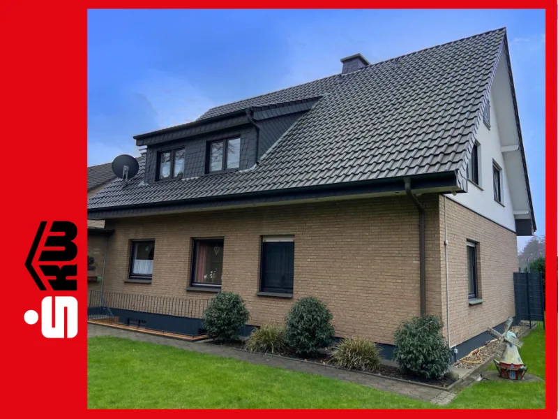 Hausansicht - Haus kaufen in Gütersloh - Top gepflegtes Zuhause für 2 Parteien!***4120 G Zweifamilienhaus in GT-Avenwedde