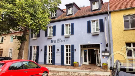 Frontansicht - Haus kaufen in Rheinsberg - Top gelegene Immobilie in RheinsbergEinmalige Gelegenheit für Anleger, Gastronomen und Hoteliers.