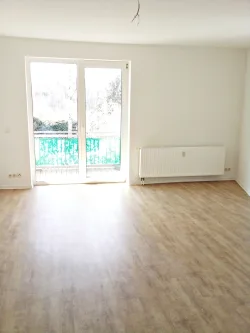 Wohnzimmer - Wohnung mieten in Schkeuditz - *** Schicke Single Wohnung mit großer Küche und Balkon in Schkeuditz ***