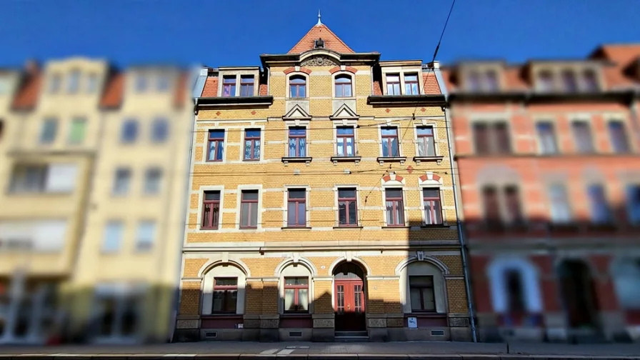 Vorderansicht - Wohnung kaufen in Dresden / Pieschen Süd - Vermietete Dachgeschosswohnung mit Tiefgaragenstellplatz als Kapitalanlage in Dresden / Pieschen