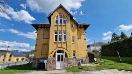 Haus seitlich - Wohnung kaufen in Olbernhau - Für Kapitalanleger/Eigennutzer - Eigentumswohnung oder ggf. Ferienwohnung in Olbernhau - Erzgebirge