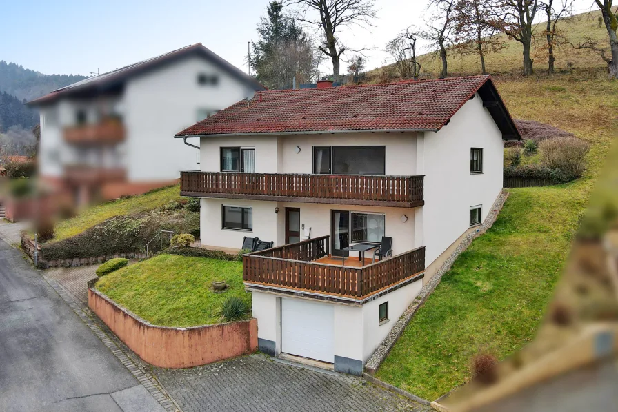 Süd-Ansicht - Haus kaufen in Oberzent - Charmantes Einfamilienhaus in Hanglage mit großem Potenzial