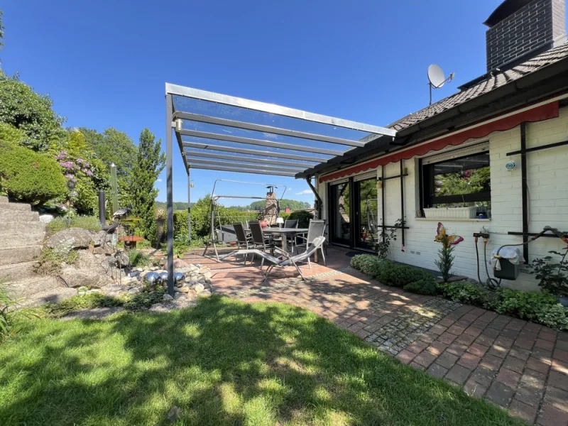 Terrassenbereich - Haus kaufen in Weinheim - Einfamilienhaus in ruhiger Waldrandlage mit außergewöhnlichem Gartengrundstück in Rippenweier.