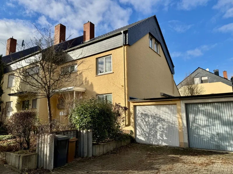 Straßenansicht - Haus kaufen in Mommenheim - Reihenendhaus mit Garage