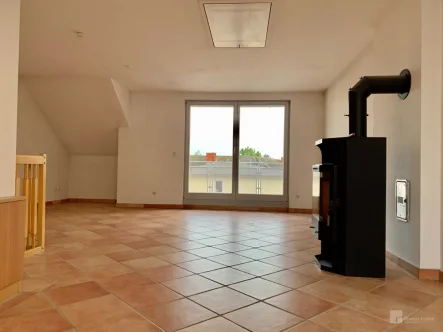 Der Kamin im Wohnzimmer - Wohnung mieten in Schwerin - Maisonette mit Seeblick und Kamin: 3-Zimmer-Wohnung in der Schweriner Innenstadt