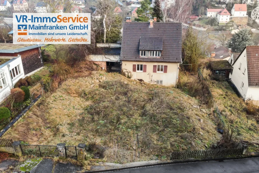 Titelbild - Grundstück kaufen in Höchberg - Traum Grundstück mit Weitblick