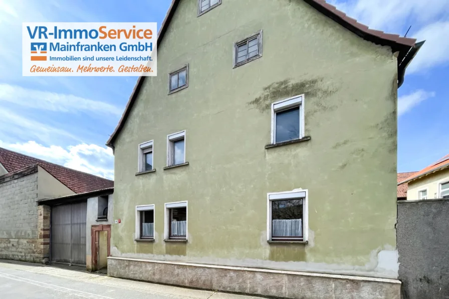 Titelbild - Haus kaufen in Leinach - Potenzial entfalten: Sanierungsbedürftiges Haus wartet auf neue Gestaltungsideen