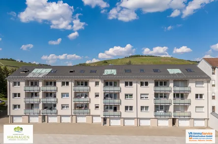 Titelbild - Wohnung kaufen in Würzburg - Wohnen an den Mainauen - Freiraum unter den Wolken: Leer stehende 3-Zimmer-Dachgeschosswohnung