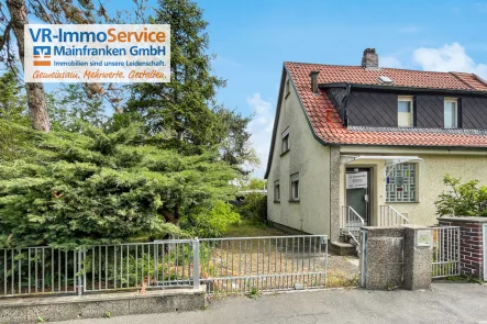 Titelbild - Haus kaufen in Würzburg - Sanierungsbedürftige Doppelhaushälfte im Frauenland