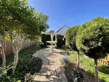 Gepflegter Garten - Haus kaufen in Penzberg - Schickes Reihenmittelhaus in bevorzugter Lage von Penzberg