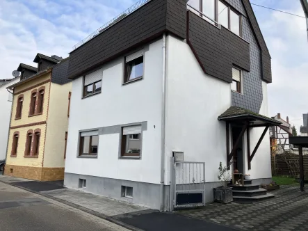 Startbild 1 - Haus kaufen in Neuwied - Gepflegt und zentral gelegenes Ein - Mehrgenerationenhaus im Ortskern von Heimbach-Weiß (Neuwied)