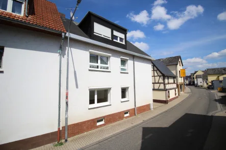 Startbild - Haus kaufen in Sankt Sebastian - Ein-/ oder Zweifamilienhaus mit Charakter - Wohnen mitten in St. Sebastian