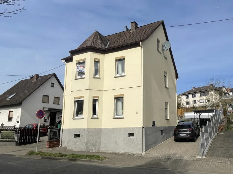 Straßenansicht - Haus kaufen in Neuwied-Oberbieber - Mein Jahr, mein Haus, meine Zukunft