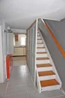 Flur EG mit Treppe zum OG