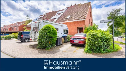 Hausansicht - Haus kaufen in Norderstedt - Solide Kapitalanlage - vermietetes Endreihenhaus in Norderstedt-Mitte!