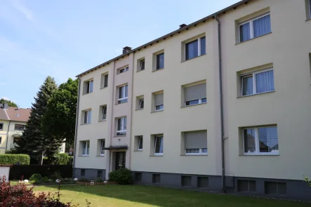 Hausansicht - Wohnung kaufen in Essen / Schönebeck - Gepflegte 3-Zimmer Wohnung mit schönem Balkon  - zentral zwischen Essen und Mülheim