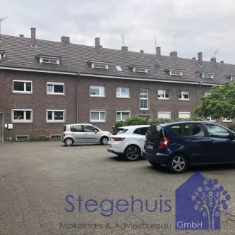 Wohnblock - Wohnung kaufen in Gronau (Westfalen) - ***STEGEHUIS GMBH*** 3-Zimmer-Wohnung in zentraler Lage von Gronau. Gute Kapitalanlage. Ideal für Singles oder Paare!