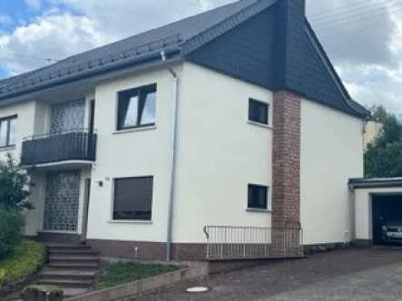 Straßenansicht - Haus kaufen in Eppelborn - VERKAUFT ! schönes, geräumiges Einfamilienhaus in Eppelborn