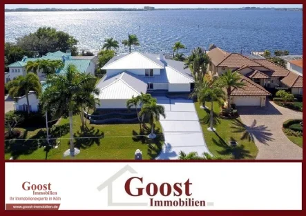 Immobilie in Cape Coral Goost Immobilien - Haus kaufen in Cape Coral - Einzigartiges, luxuriöses Anwesen am Flussufer mit Südlage und einem Wow-Effekt.