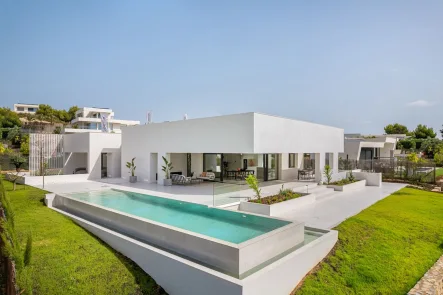  - Haus kaufen in Orihuela Costa - Luxusvilla mit 3 Schlafzimmern, 3 Bädern und Privatpool im exklusiven Las Colinas Golf Resort