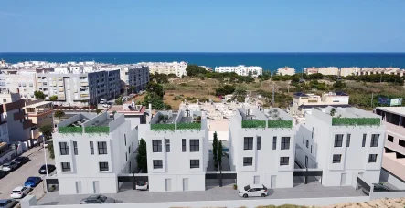  - Haus kaufen in Guardamar del Segura - Doppelhaushälften mit 4 Schlafzimmern, 4 Bädern, Dachterrasse mit Meerblick, Aufzug und Privatpool nur 900 m vom Strand