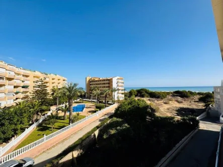  - Wohnung kaufen in La Mata - Renoviertes Appartement mit 2 Schlafzimmern, 1 Bad, Balkon mit Meerblick und Gemeinschaftspool nur 200 m vom Strand