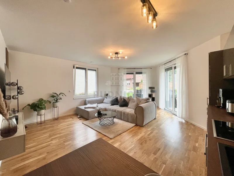 Wohnzimmer - Wohnung mieten in Garbsen - RUDNICK bietet exklusive Wohnung in einzigartiger & ruhiger Feldrandlage