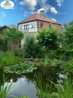 Haus und Teich - Haus kaufen in Sachsenhagen - RUDNICK bietet: Bieterverfahren mit Mindestpreis!Historisch sanierte Jugendstilvilla