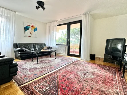 Wohnzimmer - Wohnung kaufen in Langenhagen - RUDNICK bietet GUT GESCHNITTEN + CITYNAH: gepflegte 2-Zi.-Eigentumswohnung im Herzen von Langenhagen