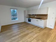 Musterwohnung Wohnzimmer und Küche