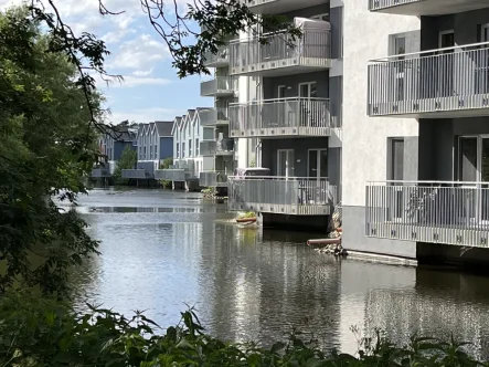 Rückansicht - Wohnung kaufen in Wangerland - Sonnige Südwohnung zur Ferienvermietung! Neuwertig und in Strandnähe