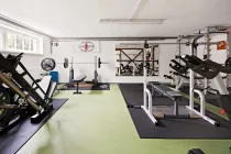 Fitnessbereich im Keller