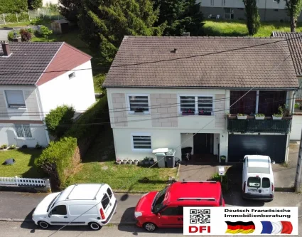 Ansicht - Haus kaufen in Sarreguemines - Gepflegtes Einfamilienhaus in einer ruhigen Wohngegend von Sarreguemines