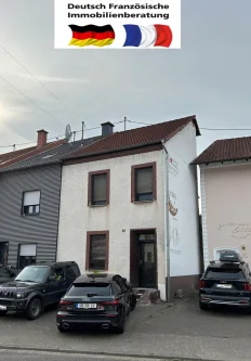 Neuforweiler Ansicht - Haus kaufen in Saarlouis / Neuforweiler - Einseitig angebautes Einfamilienhaus in Neuforweiler