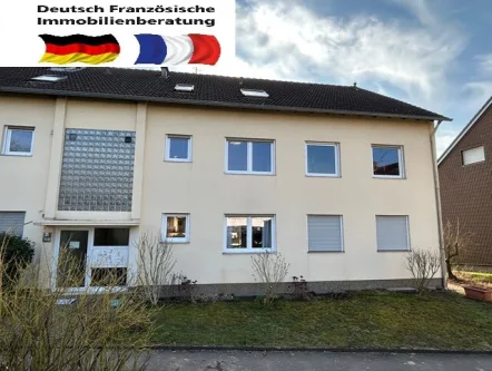 Ansicht - Wohnung kaufen in Saarbrücken / Bischmisheim - Schöne Etagenwohnung mit Balkon und Garage in Bischmisheim zu verkaufen