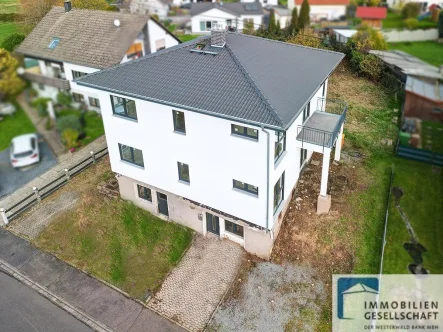 Luftaufnahme - Haus kaufen in Schenkelberg - !!Reduzierter Kaufpreis!!! Neuwertiges Ausbauhaus in schöner Lage nähe Selters! 