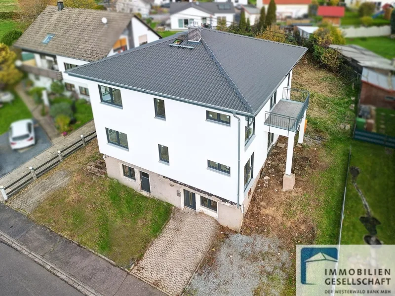 Luftaufnahme - Haus kaufen in Schenkelberg - !!Reduzierter Kaufpreis!!! Neuwertiges Ausbauhaus in schöner Lage nähe Selters! 